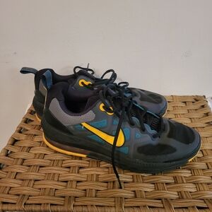 Black and Teal Athletic Sneakers with Yellow Accent